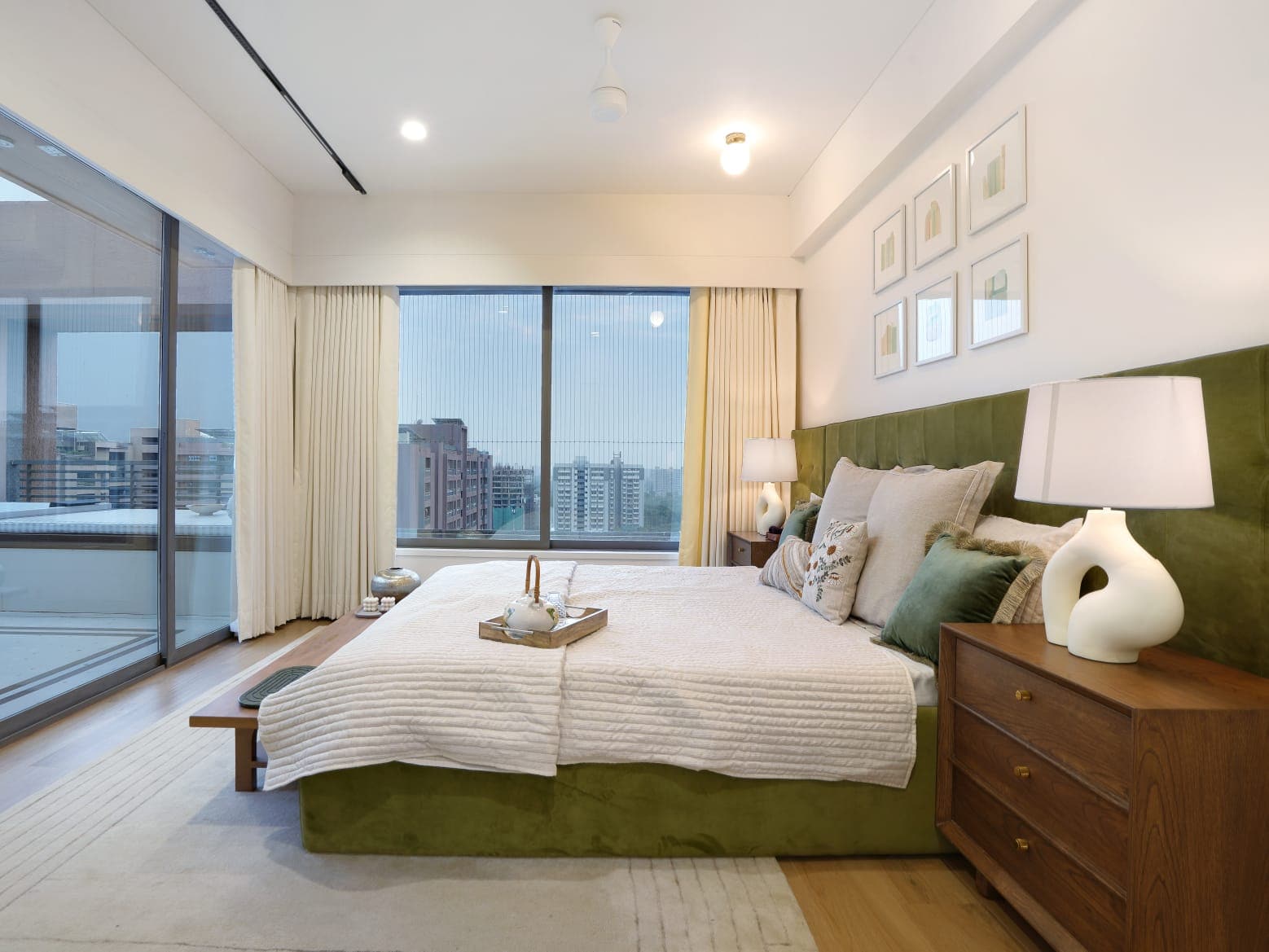 Green velvet bedroom photographed from the side