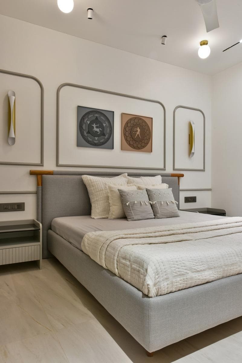 Grey upholstered bed with fluted bedside units