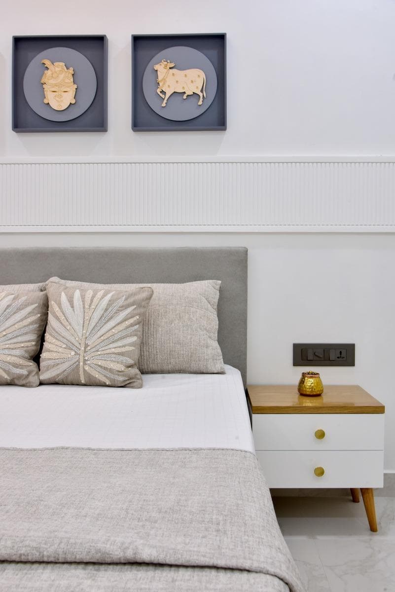 Detail of grey upholstered headboard stitching