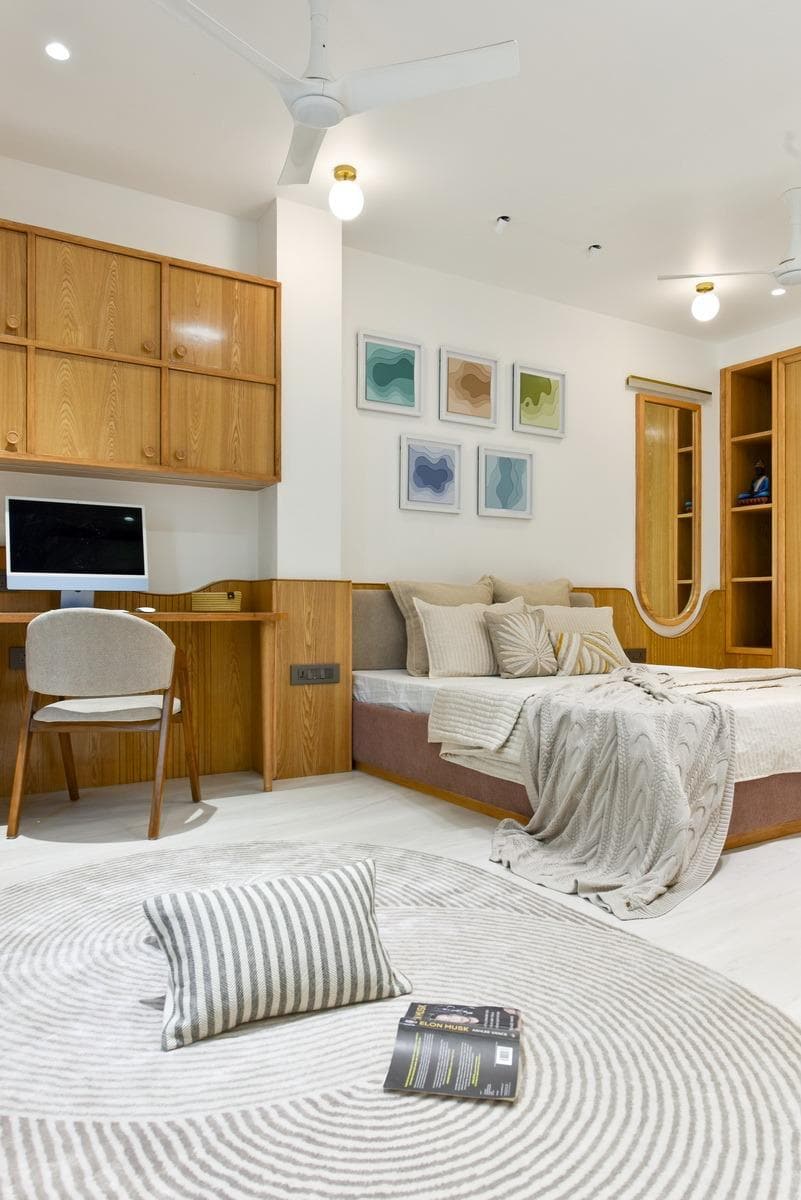Integrated teak wall with wardrobe, desk and TV panel