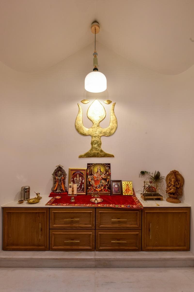 Teak puja room cabinet with marble top and brass lamp