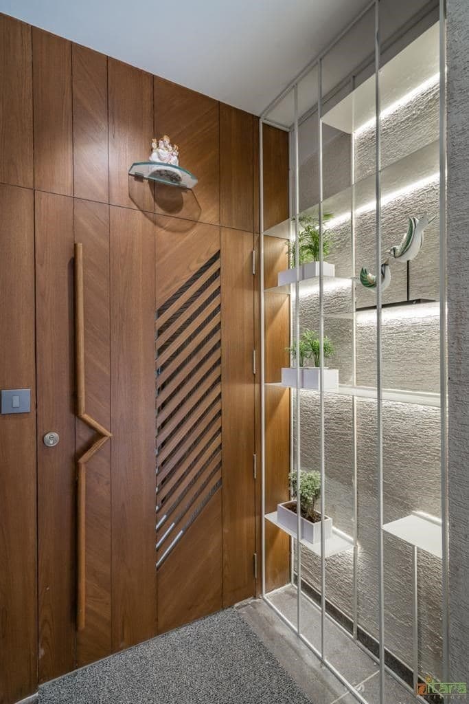 Wooden door with chevron handle and frosted glass sidelight