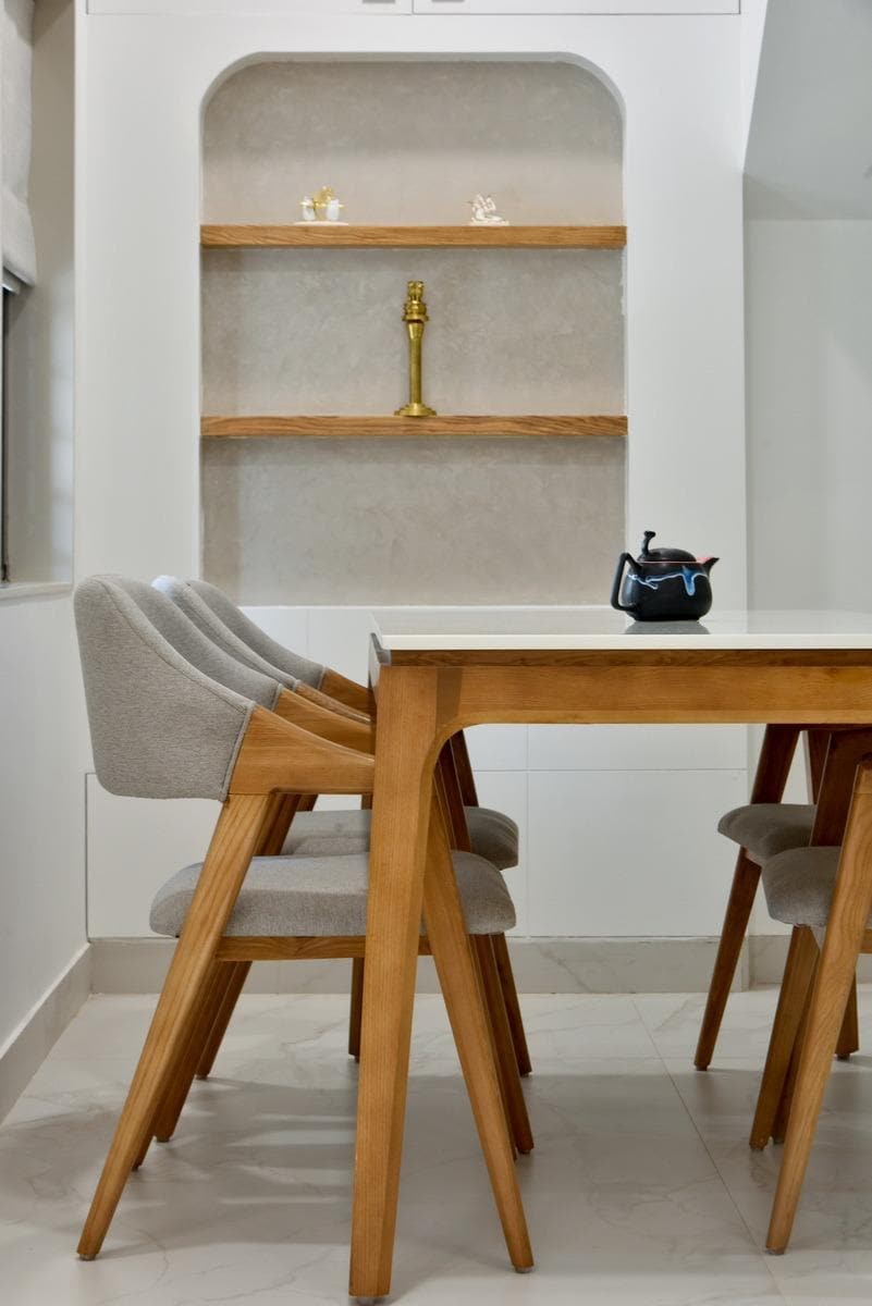Teak dining chair and table edge detail