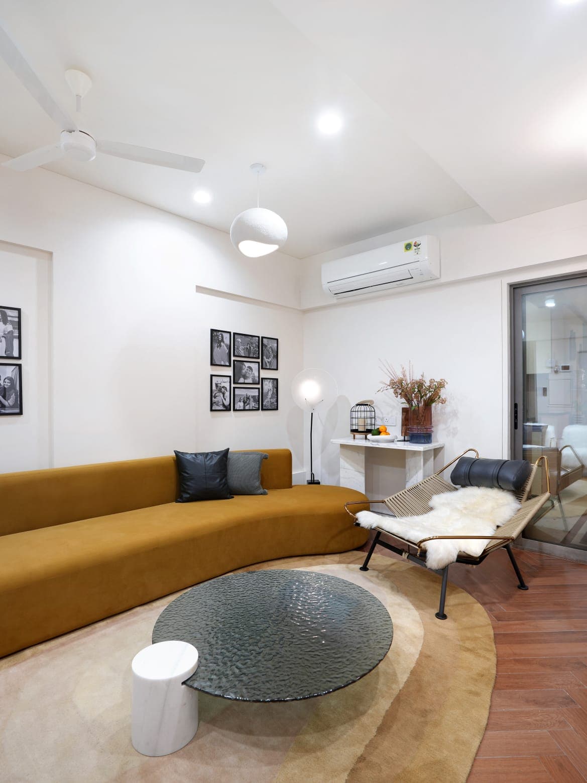 Mustard curved sofa living room designed by Jay Ambe Furniture