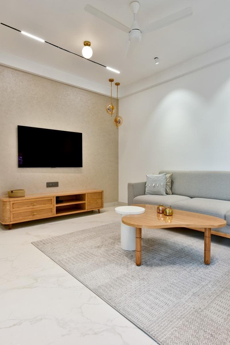Solid teak TV console with tapered legs