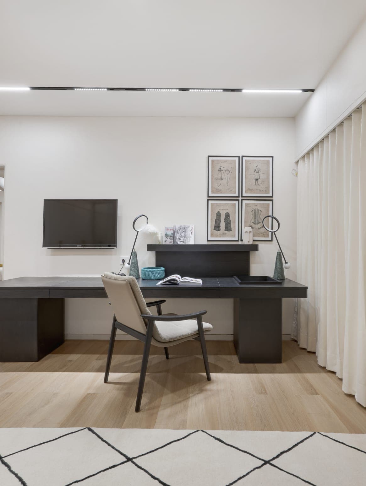Wall unit combining TV panel and built-in study desk
