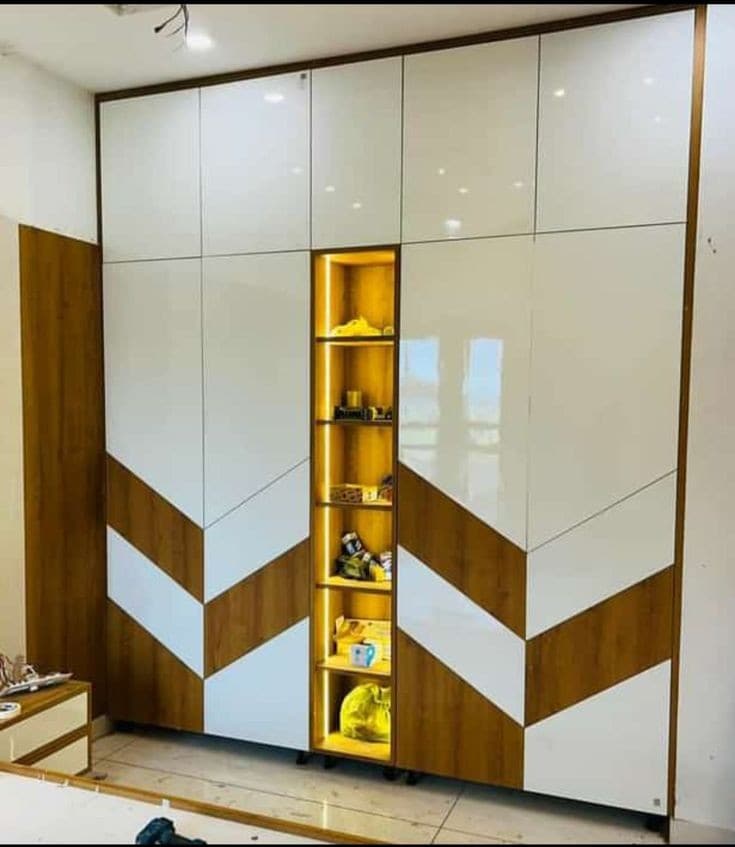 Gloss chevron wardrobe with backlit display shelves